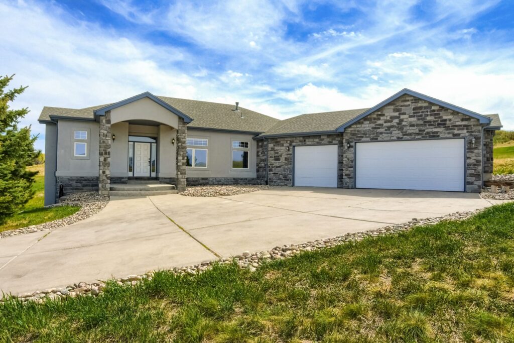 Stone and stucco ranch home on Bell Mountain Drive in Bell Mountain Ranch, Castle Rock, CO