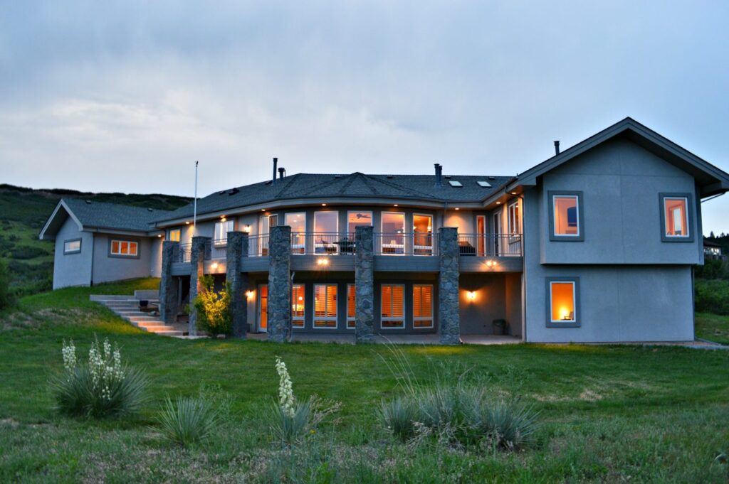 Twilight view of a walkout home on Serenade Road in Bell Mountain Ranch, Castle Rock, CO, sold by the Joan Pratt Group