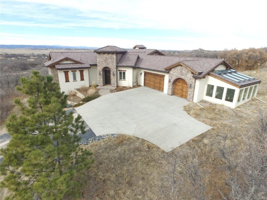 Stucco and stone home on Serenade Road in Bell Mountain Ranch, Castle Rock, CO, sold by the Joan Pratt Group