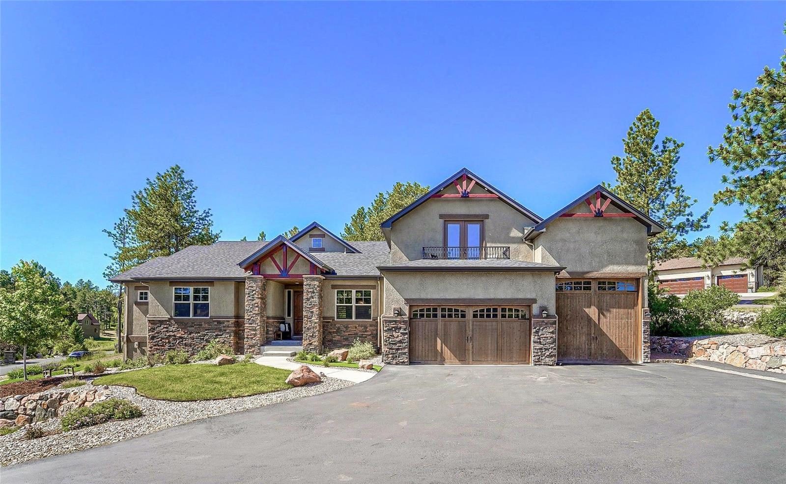 Stone and stucco home in Hidden Forest, Larkspur, CO