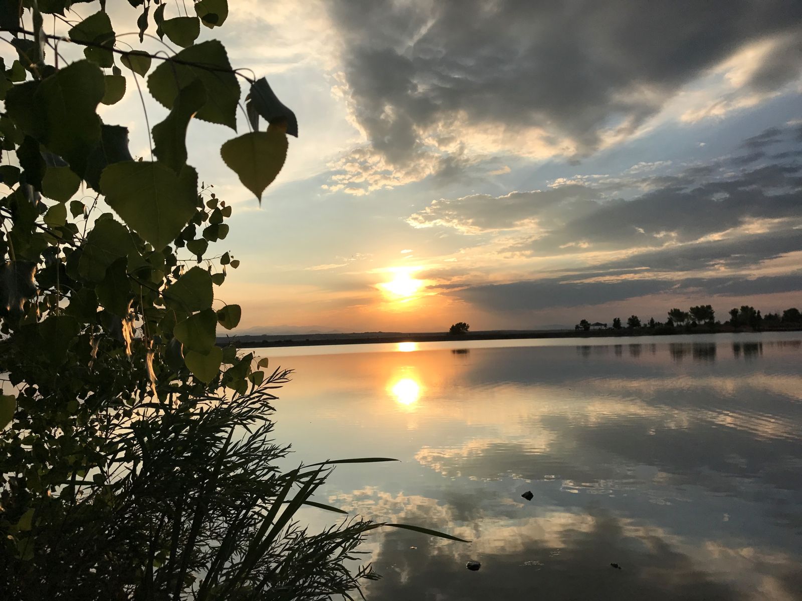 Sunset over a lake in Parker, CO